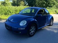 Gebraucht VW New Beetle 75 PS (55 kW) 2006 Laser blue perleffekt Kleinwagen