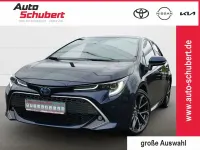 Gebraucht Toyota Corolla Hybrid Lounge 184 PS (135 kW) 2023 Blau Limousine