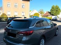 Second-hand Opel Astra Dynamic 105 CP (77 kW) 2017 Gri Break