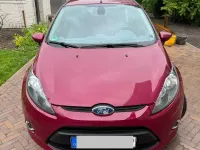 Second-hand Ford Fiesta Titanium 82 CP (60 kW) 2009 Roșu Berlinǎ