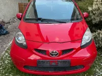 Gebraucht Toyota Aygo 68 PS (50 kW) 2007 Rot Kleinwagen