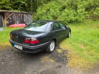 Gebraucht Opel Omega 136 PS (100 kW) 1999 Schwarz Limousine