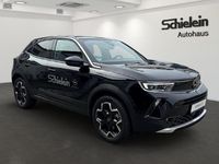 Gebraucht Opel Mokka-e Ultimate 100 kW (136 PS) 2023 Diamant schwarz/karbon schwarz SUV
