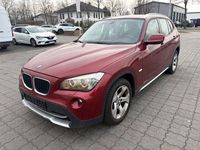 Second-hand BMW X1 xLine 143 CP (105 kW) 2009 Roșu SUV