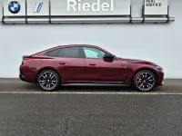 Gebraucht BMW i4 400 kW (544 PS) 2023 Aventurinrot metallic Limousine