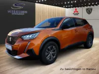Second-hand Peugeot e-2008 Active 100 kW (136 CP) 2022 Portocaliu SUV