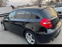 Second-hand BMW 116 122 CP (89 kW) 2009 Negru Hatchback