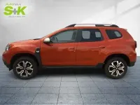 Używany Dacia Duster Prestige 101 KM (74 kW) 2022 Pomarańczowy SUV