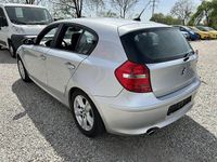 Gebraucht BMW 116 122 PS (89 kW) 2009 Titansilber metallic Kleinwagen