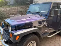 Gebraucht Jeep Wrangler Sport 177 PS (130 kW) 1999 Violet SUV