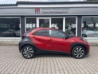 Gebraucht Toyota Aygo Pulse 72 PS (52 kW) 2024 Chili red / black mica Kleinwagen