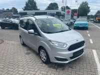 Gebraucht Ford Tourneo Courier Trend 101 PS (74 kW) 2015 Silber Van / Kleinbus