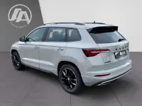 Gebraucht Skoda Karoq SportLine 190 PS (139 kW) 2023 Steel grau SUV