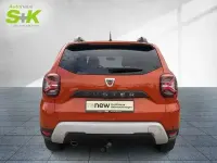 Używany Dacia Duster Prestige 101 KM (74 kW) 2022 Pomarańczowy SUV