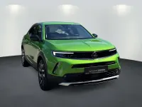 Gebraucht Opel Mokka-e Elegance 100 kW (136 PS) 2022 Matcha green (metallic) SUV