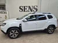 Używany Dacia Duster Prestige 101 KM (74 kW) 2021 Biały SUV