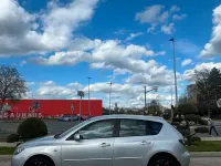 Używany Mazda 3 109 KM (80 kW) 2006 Szary Sedan/Limuzyna