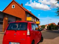 Gebraucht Daihatsu Cuore 58 PS (42 kW) 2006 Rot Kleinwagen