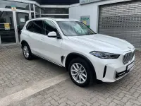 Gebraucht BMW X5 381 PS (280 kW) 2024 Mineralweiss metallic SUV