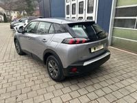 Gebraucht Peugeot e-2008 Active 100 kW (136 PS) 2023 Artense silber metallic SUV