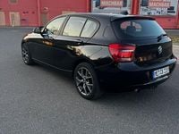 Second-hand BMW 114 102 CP (75 kW) 2014 Negru Hatchback