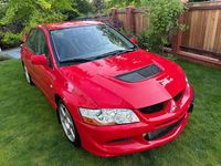 Second-hand Mitsubishi Lancer Evolution 265 CP (194 kW) 2006 Roșu Berlinǎ