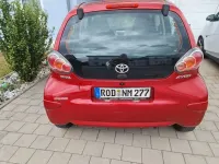 Gebraucht Toyota Aygo 68 PS (50 kW) 2010 Rot Kleinwagen