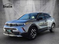 Gebraucht Opel Mokka-e Elegance 100 kW (136 PS) 2022 Kontrast grau/quarz silber (metallic) SUV