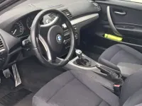 Gebraucht BMW 116 122 PS (89 kW) 2009 Schwarz Kleinwagen