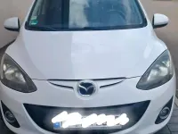 Gebraucht Mazda 2 Active 84 PS (61 kW) 2011 Weiß Kleinwagen