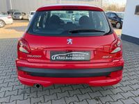 Gebraucht Peugeot 206+ Basis 75 PS (55 kW) 2009 Rot Kleinwagen