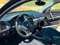 Gebraucht BMW 116 122 PS (89 kW) 2009 Schwarz Kleinwagen