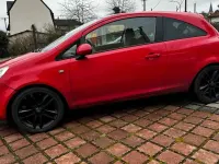 Gebraucht Opel Corsa 101 PS (74 kW) 2010 Rot Kleinwagen