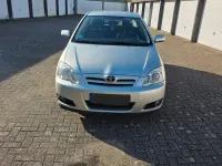Używany Toyota Corolla 90 KM (66 kW) 2006 Srebrny Sedan/Limuzyna