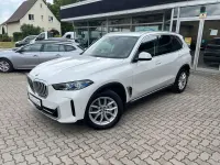 Gebraucht BMW X5 381 PS (280 kW) 2024 Mineralweiss metallic SUV