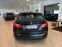 Gebraucht BMW 218 Gran Tourer Luxury Line 150 PS (110 kW) 2016 Schwarz Van / Kleinbus