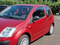 Gebraucht Citroën C2 Tonic 60 PS (44 kW) 2009 Farbe luziferrot/metallic Kleinwagen