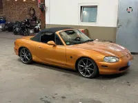 Gebraucht Mazda MX5 110 PS (80 kW) 1999 Orange Cabrio