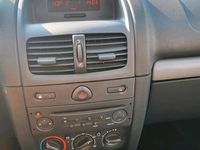 Używany Renault Clio II 75 KM (55 kW) 2011 Czarny Sedan/Limuzyna