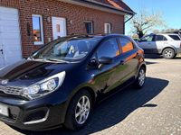 Second-hand Kia Rio 108 CP (79 kW) 2012 Negru Hatchback