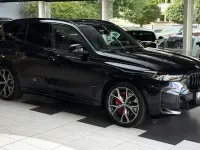 Gebraucht BMW X5 M 530 PS (389 kW) 2024 Saphirschwarz SUV