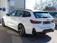 Gebraucht BMW 320e M Sport 204 PS (150 kW) 2023 Weiß Kombi