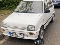 Gebraucht Daihatsu Cuore 41 PS (30 kW) 1989 Weiß Kleinwagen