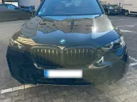 Używany BMW X5 Performance 489 KM (359 kW) 2024 Czarny SUV