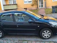 Gebraucht Peugeot 206+ 73 PS (53 kW) 2012 Schwarz Kleinwagen