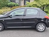 Gebraucht Peugeot 206+ 75 PS (55 kW) 2009 Schwarz Kleinwagen