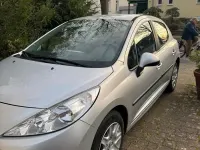 Gebraucht Peugeot 207 73 PS (53 kW) 2010 Silber Kleinwagen