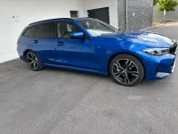 Gebraucht BMW 330e M Sport 292 PS (214 kW) 2024 Blau Kombi