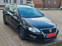 Second-hand VW Passat Sportline 160 CP (117 kW) 2009 Negru Break