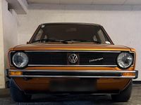 Second-hand VW Golf I GTI 75 CP (55 kW) 1976 Auriu Hatchback